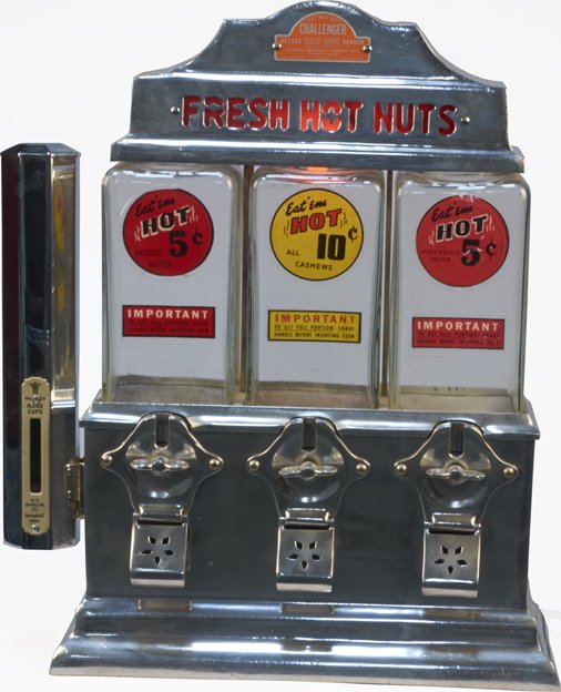 5 & 10 Cent Tropical Trading Co. "The Challenger": 5 & 10 Cent Tropical Trading Co. "The Challenger" Deluxe Hot Nut Countertop Triple Vending Machine w/ No. 25 Ajax Side Cup Dispenser by U.S. Envelope Co., "Fresh Hot Nuts" light-up top sign, Polished