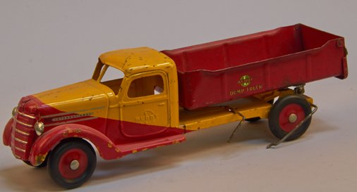 Vintage Buddy 'L' Pressed-Steel International Dump Truc: Vintage Buddy 'L' Pressed-Steel International Dump Truck, red & yellow w/ embossed doors - 22"l