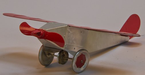 Lot of 3 - Vintage Misc. Airplane Model/Toys:: Lot of 3 - Vintage Misc. Airplane Model/Toys: 1 - hand-made pressed-steel single engone plane w/ movable propeller & wheels - w.s. 18"l., 1 - red plastic "Red Baron" style single engine plane, looks l