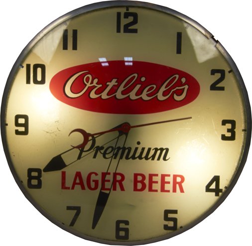 Ortlieb's Premium Lager Beer Light-Up Round Wall Clock: Ortlieb's Premium Lager Beer Light-Up Round Advertising Wall Clock by Central Lighting Fixture Co. , "A Glow Sign" - 15"d