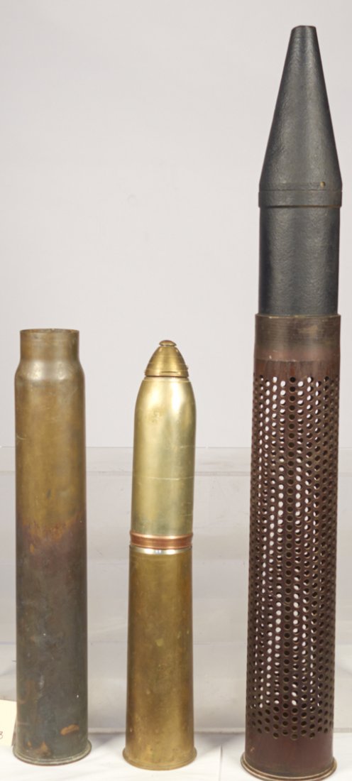Lot of Artillery Shell Casings:: Lot of Artillery Shell Casings: 1 - 3" 1945 Anti-aircraft, 1 - Korean War-Vietnam War 106 mm recoilless round & 1 - 105 mm dummy, "Fascimile Eighteen Pounder Shrapnel Shell", "N.G.F.4 Lot 54 3 in. Jun