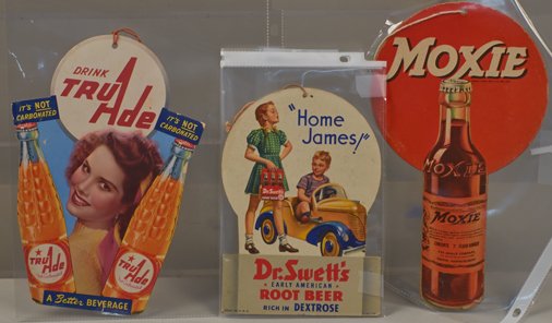 Lot of 3 - Misc. Beverage Cardboard Die-Cut Advertiseme: Lot of 3 - Misc. Beverage Cardboard Die-Cut Advertisement Light-Pulls w/ Original Strings: 1 - double sided, "Dr. Swett's Root Beer - HOME JAMES!" - approx. 6" x 8"h., 1 - "Moxie" - 6" x 11"h. & 1 - d