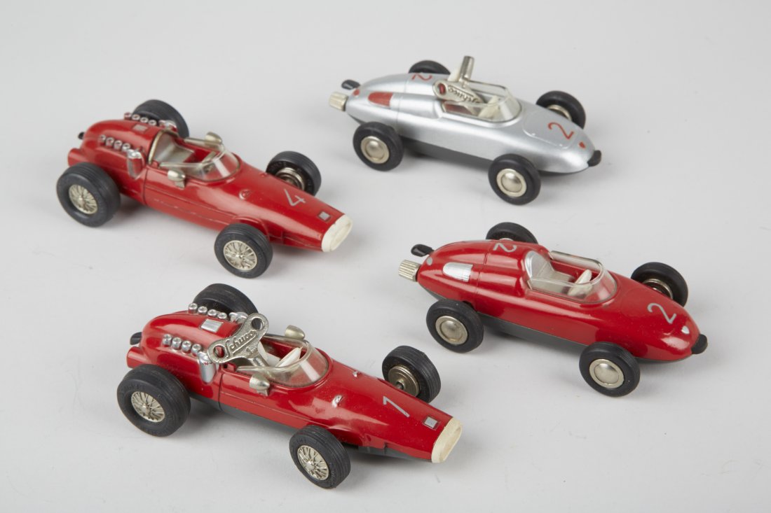 Lot of 4 - Schuco Die-Cast Micro Racer c1950's: Lot of 4 - Schuco Die-Cast Micro Racer c1950's Toy Race Cars, Made In Western Germany, Wind-Up w/ Rubber Tires: 2 - No. 1040/1's, 1 - Ferrari & 2 - No. 1037, Porsche - all approx. 5"l