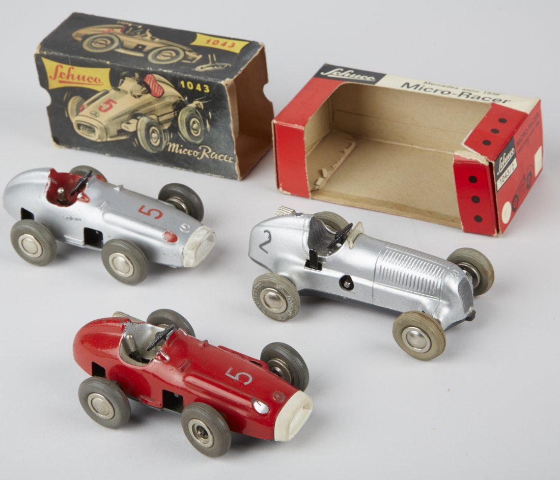 Lot of 3 - Schuco Die-Cast Micro Racer c1950's: Lot of 3 - Schuco Die-Cast Micro Racer c1950's Toy Race Cars, Made In Western Germany, Wind-Up w/ Rubber Tires: 2 - No. 1043's (red No. 5 & silver No. 5) w/ box & 1 - No. 1043/2 silver No. 2 - each 4"