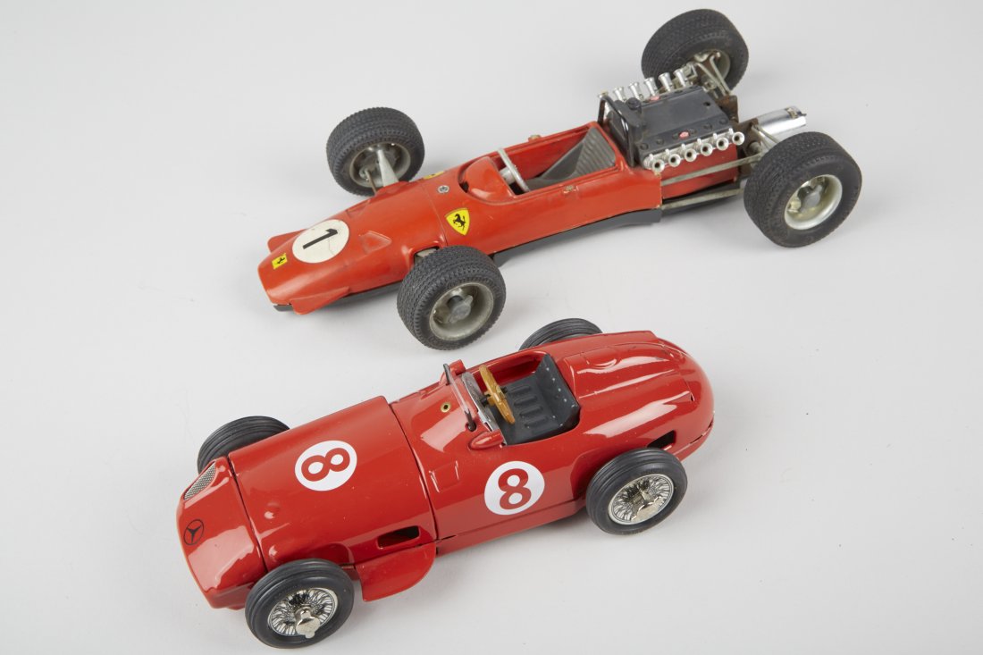 Lot of 2 - Schuco Die-Cast Toy Race Cars, Made: Lot of 2 - Schuco Die-Cast Toy Race Cars, Made In Germany, Wind-Up w/ Rubber Tires: 1 - No. 1073, red Ferrari Formula 2 No. 1 - 9-1/2"l. & 1 - Studio VII, red Mercedes Benz-W196 Monoposto No. 8 - appr