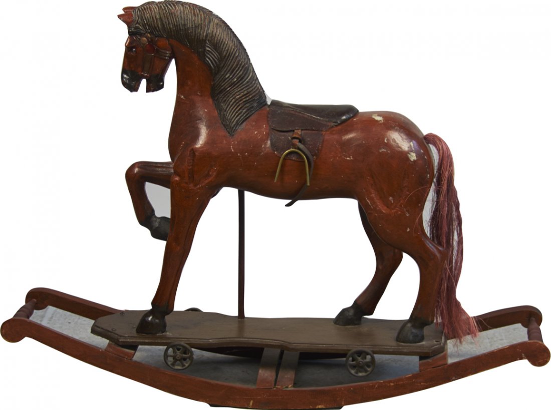 Early Carved Wood Child's Rocking Horse: Early Carved Wood Child's Rocking Horse w/ wheels mounted onto rocker base, Marble eyes, hair tail, wood handles & leather saddle - 48" x 35"