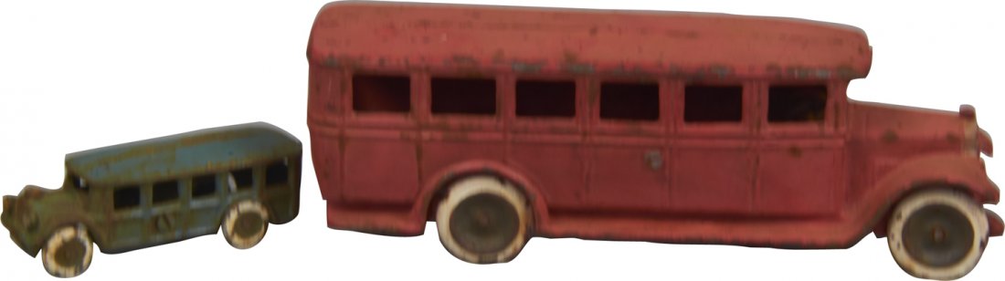 Lot of 2 Cast-Iron Toy Buses:: Lot of 2 Cast-Iron Toy Buses: 1 - Painted red, "AB Skoglund & Olson Cefle" - 10" long & 1 - Painted blue - 4.5" long