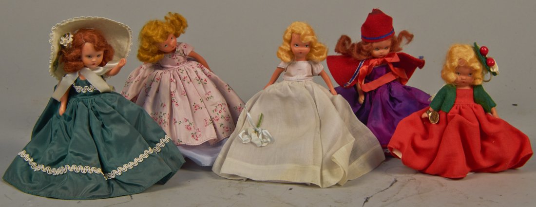 Lot of 5 - Nancy Ann Month Series Dolls:: Lot of 5 - Nancy Ann Month Series Dolls: 1 - No. 191, May, bisque, 1 - No. 189, A Breezy Girl For March, plastic, 1 - No. 191, May, bisque, 1 - No. 193, July, plastic & 1 - No. 198, December Just A De