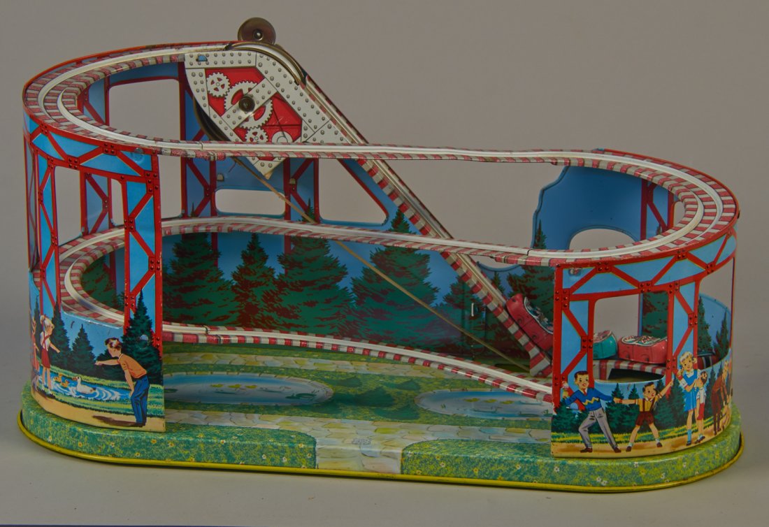 Vintage J. Chein & Co. Tin Litho. Roller Coaster Toy: Vintage J. Chein & Co. Tin Litho. Wind-Up Mechanical Roller Coaster Toy w/ 4 cars w/ wheels, Made in USA c1950's, Wind-up belt track to pull cars up & then cars roll down the course. Great condition,