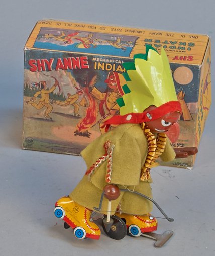 Vintage Linemar "Shy Anne" Mechanical Indian Skater: Vintage Linemar "Shy Anne" Mechanical Indian Skater Wind-Up Toy w/ Box, Tin litho. w/ cloth, plastic & wood, Made in Japan J-9040, Walt Disney Productions (from Walt Disney's Babes In Toyland) - 7"h
