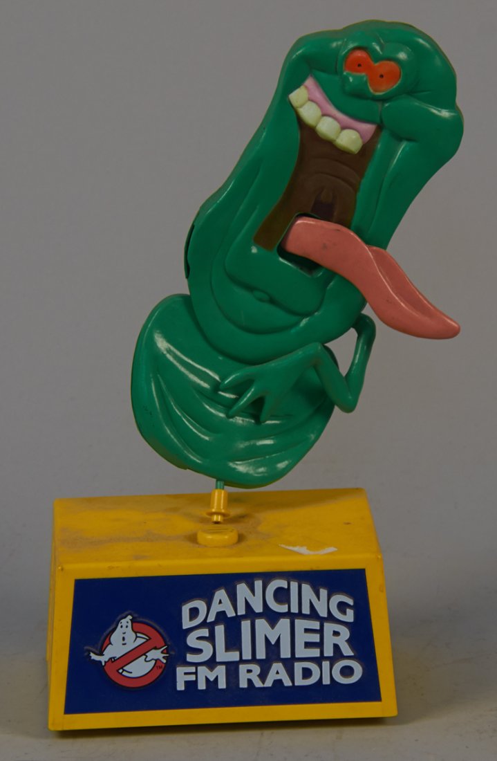 Ghostbusters Dancing Slimer Plastic Tabletop FM Radio: Ghostbusters Dancing Slimer Plastic Tabletop Battery FM Radio, Combination radio & microphone, MFG by Justin Products, Korea for Columbia Pictures c1984, Slimer character moves w/ sound