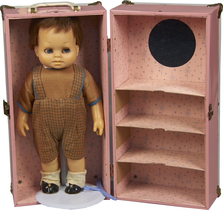 Lot Of Vintage Pink Child's Doll Items:: Lot of Vintage Pink Child's Doll Items c1950s: 1 - Doll-E-Hichair by Amsco, metal - 25"h, 1 - Wicker wooden doll cradle - 19" x 15"h & 1 - Chatty Cathy's baby brother doll on stand in doll case w/ sta