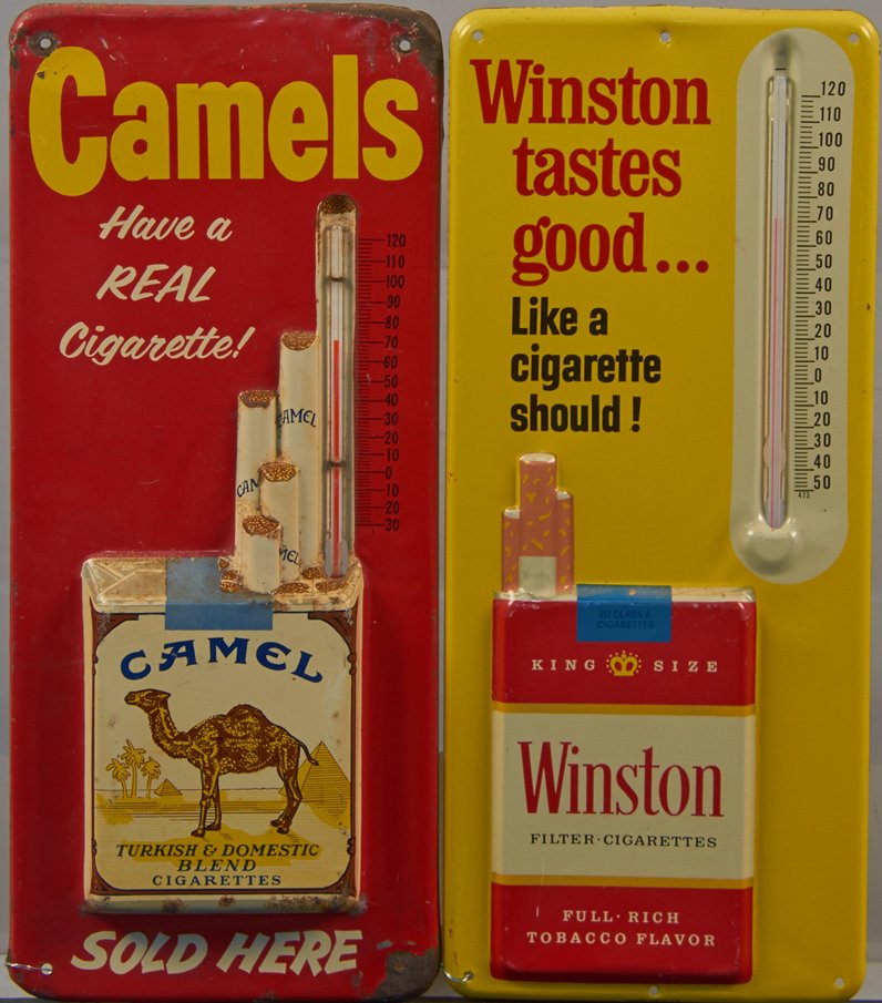 Lot of 2 - Embossed Tin Thermometer Cigarette Advertise: Lot of 2 - Embossed Tin Thermometer Cigarette Advertisement Signs: 1 - Winston & 1 - Camel - each approx. 6" x 14"
