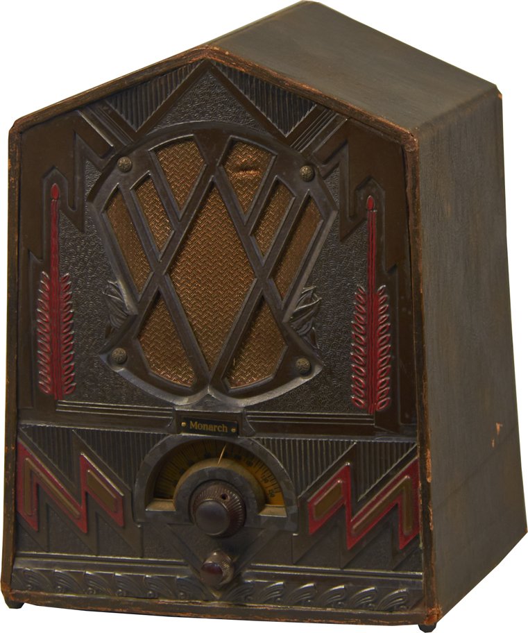 Audiola Model 13-4T "Monarch" Art Deco Cathedral Radio: Audiola Model 13-4T "Monarch" Art Deco Tabletop Cathedral Radio, Leatherette cased w/ molded plastic very ornate deco front & half circle dial, AC - 10 1/2" x 8 1/4" x 13 1/4"