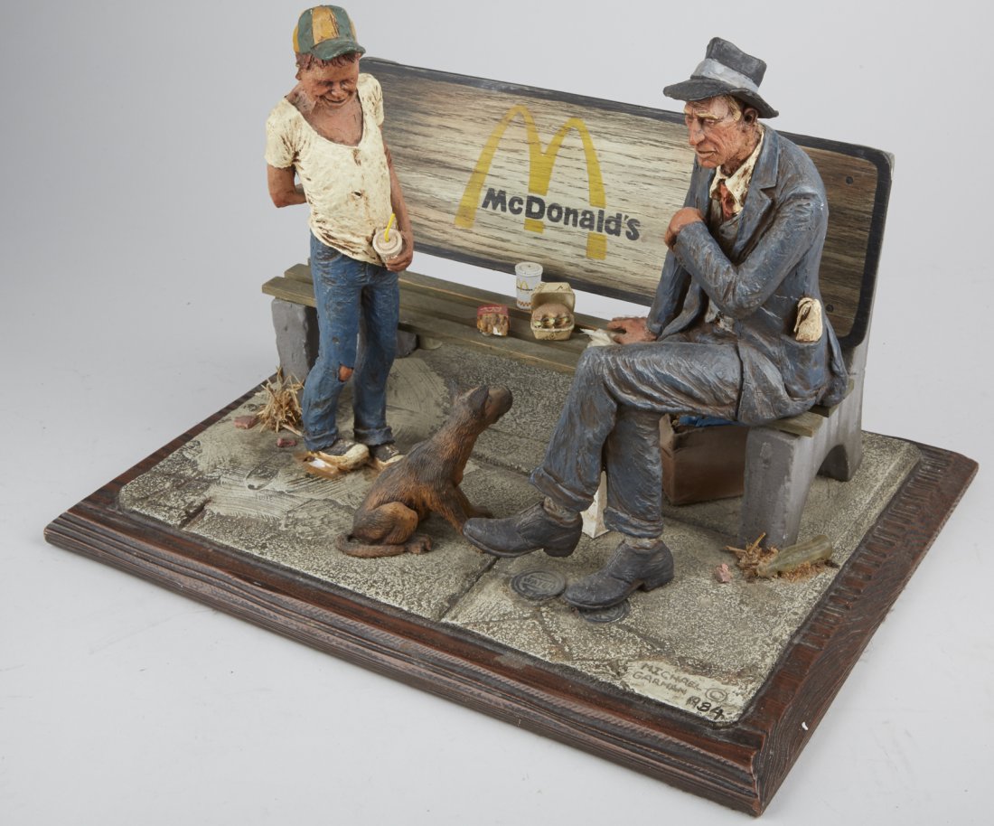 McDonald's Bus Bench Model Sculpture By Michael Garman: McDonald's Bus Bench Model Sculpture By Michael Garman c1984, Signed, Featuring figural man on bench w/ food, seated dog & another man standing w/ debris & graffiti cityscape - 15" x 11" x 11"