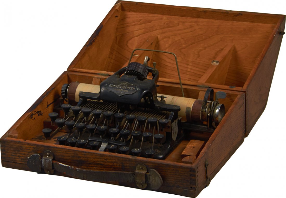 Antique Blickensderfer No. 5 Typewriter In Wood Case: Antique Blickensderfer No. 5 Typewriter In Wood Travel Case w/ Leather Handle & Latch, Slope top case, "Blickensderfer, Stamford, Conn.". This model of typewriter was introduced at the 1893 World's Co