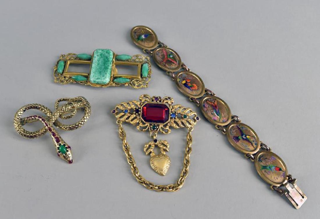 Group Of Victorian And Contemporary Jewelry: Consisting Of A Czech Victorian Ribbon Buckle, An Enamel Painted Bird Bracelet, A Snake Pin And Goldtone Red Pin