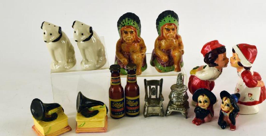 Group Of Figural Japan Salt And Pepper Shakers: Consisting Of Seven Sets, Rca, Nippon,dutch Boy And Girl Kissing, Record Player, Indian Chief, Blatz Beer, Lady Bug Witches, A Pot Belly Stove And Rocking Chair. The Tallest Is The Dutch Boy And Girl