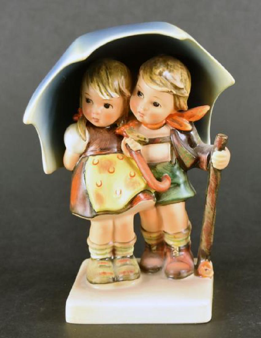 Goebel Hummel Figurine: Consisting Of The Figure Stormy Weather, In Very Good Condition, No Nicks Chips Or Cracks.