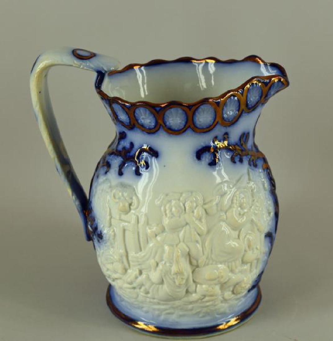 Heavily Embossed Flow Blue Pitcher (1 of 4)