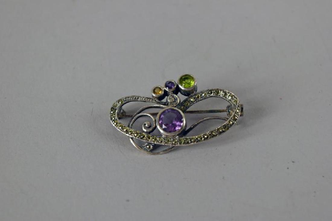 Sterling & Marcasite Free Form Contemporary Pin: Featuring Amethyst, Peridot And Topaz Accent Gemstones, The Pin Is Marked 925, Measuring 1.5 Inches By 1 Inch.