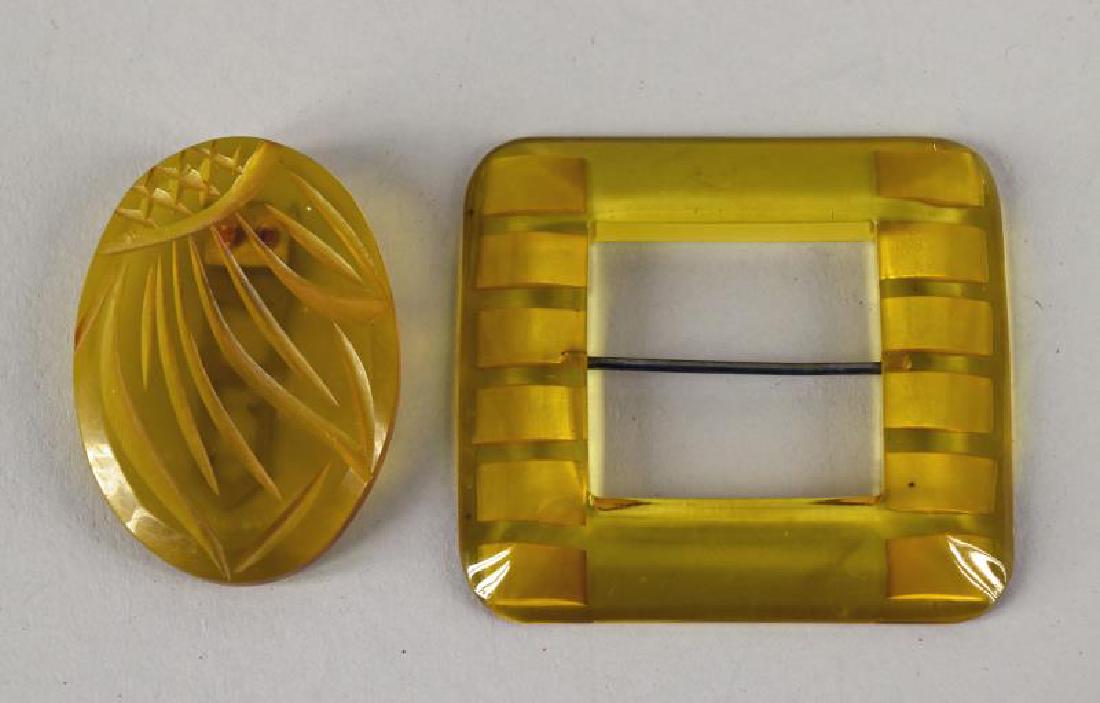 Bakelite Apple Juice Dress Clip & Ribbon Buckle: Featuring A Reverse Carved Ribbon Buckle And A Carved Dress Clip In Apple Juice Bakelite.