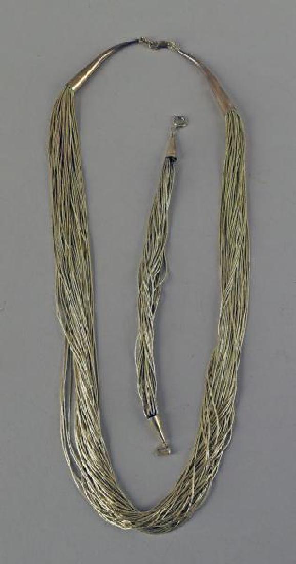 Liquid Silver Necklace And Bracelet (1 of 2)