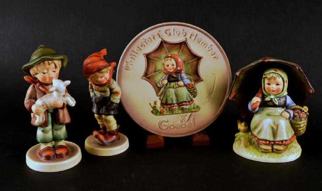 Group Of Hummel Goebel Figurines: Featuring The Goebel Collectors Club Special Edition No 2 Plate And Special Edition No. 9 Figurine. Together With The March Winds Hummel Figure And The Hummel Figure Of Lost Sheep. Both Of The Hummel'