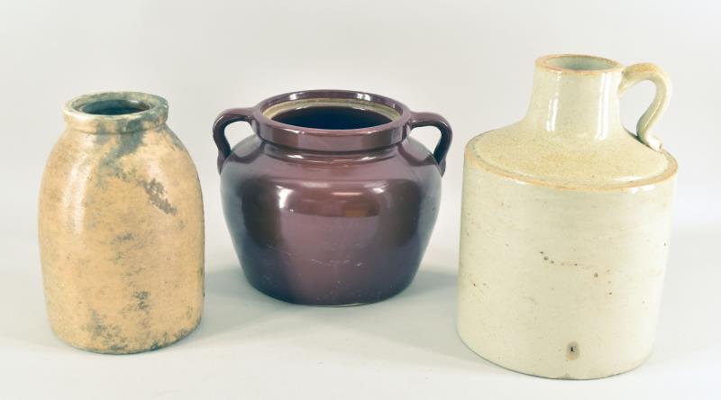 Three Stoneware Jugs And Jars: Consisting Of A Stoneware Salt Glaze Canning Jar, A Stoneware Salt Glaze Jug And A Pottery Double Handle Jar (missing Lid). The Tall Stoneware Jug Measures 10.5" Tall And 7" Across The Bottom. All Thr