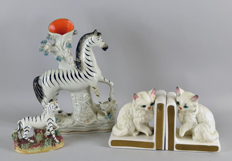Staffordshire Zebra Spill Vase: Featuring A Large Staffordshire Spill Vase With A Zebra. The Vase Does Have A Repaired Leg, A Photo Is Included. The Vase Measures 11.5" Tall, 8.5" Wide. Together With A Small Staffordshire Zebra, Mis