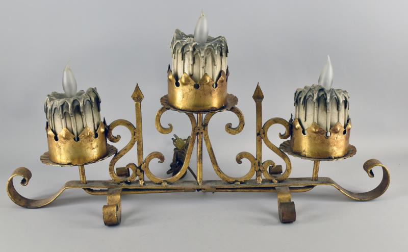 Mid-century T V Light Candle Figural: Featuring A Three Light Mid-century Candle And Metal Light Fixture. The Fixture Measures 29" Long, 15" Tall And 5.5" Deep. The Frame Of The Lights Have An Andiron Appearance And Is Painted Cast Iron. 