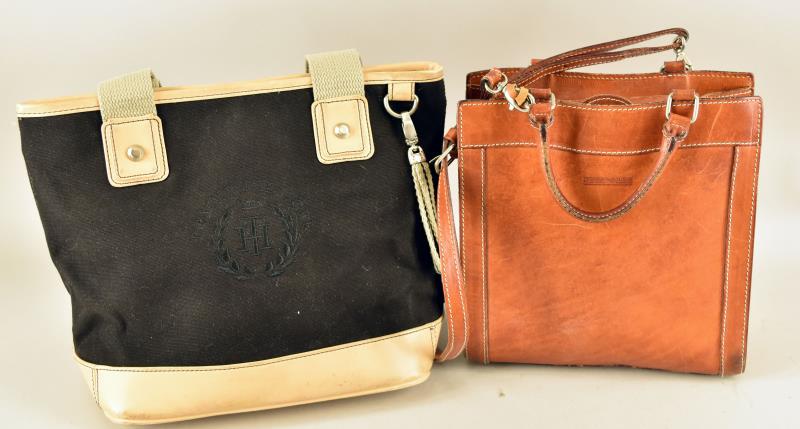 Dooney And Bourke Leather Saddle Bag: Consisting Of A Vintage Brown Saddle Leather Dooney And Bourke Hand Bag. Together With A Tommy Hillfiger Canvas Hand Bag. The Dooney And Bourke Measures 8.5" Long And 8" Wide, Not Including Straps. Bo