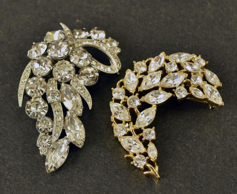 Eisenberg And Crown Trifari Rhinestone Pins: Featuring A Gold Tone Crown Trifari Crescent Shaped Pin And An Eisenberg Rhinestone Pin. The Eisenberg Measures 2.5" Long And 1.5" Wide, The Trifari Measures 2" Long And 1.5" Wide. Both Are In Excelle