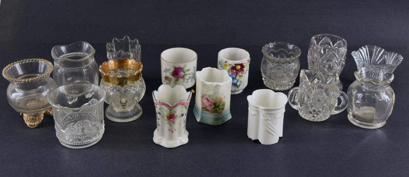 Collection Of Glass & Porcelain Toothpick Holders: Consisting Of Ten Eapg Glass Toothpick Holders And Five Porcelain Toothpick Holders. All Average Approximately 2.25" Tall. All Are In Good Condition, No Nicks, Chips Or Cracks.