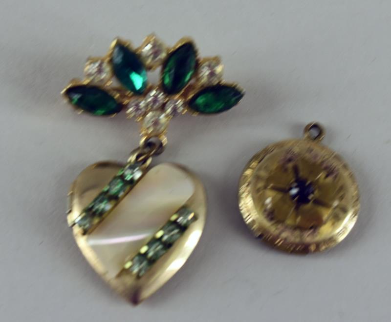 Two Vintage Lockets: Featuring A Gold Filled And Garnet Small Locket. Together With A Green Rhinestone Heart Shaped Locket. No Hallmarks On Either Locket And I Do Not Have A Stone Tester For The Garnet. The Small Locket M