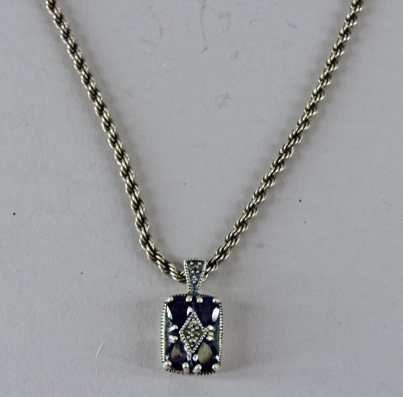 Sterling Silver And Garnet Necklace: Featuring A Sterling Silver Chain And Marcasite With Garnet Pendant. The Necklace Measures 18", The Pendant Is 1" Long And .5" Wide. Both Pieces Are Marked Several Places 925, In Good Condition, Needs