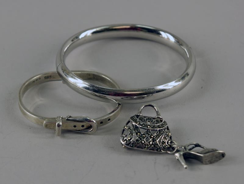 Sterling Silver Bangle And Buckle Bracelet: Featuring A Sterling Bangle Bracelet, Marked Sterling. Together With A Small Sterling Silver Buckle Bracelet And A Sterling Silver Marcasite Purse And Shoe Pin. All In Good Condition, The Small Bracel