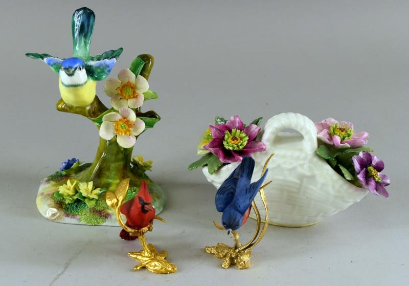 Boehm And Crown Staffordshire Figurines: Featuring Two Boehm Bird With Gilt Gold Stands. Together With A Crown Staffordshire J. T. Jones Bird And A Crown Staffordshire Flower Basket. The Boehm Birds Measure 3" Tall. The J. T. Jones Bird Meas