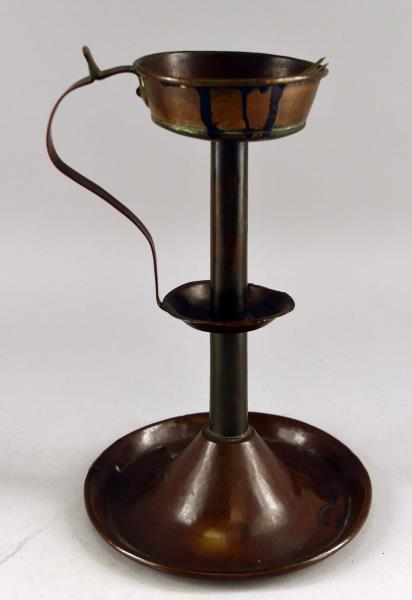 Copper Whale Oil Convent Lamp: Consisting Of A Double Tray Handle Copper Convent Lamp. Measuring 9" Tall And 6" Across. Used Condition With Dents And Dings.