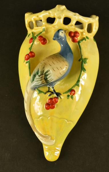 German Yellow Bird Lustre Wall Pocket: Featuring A Yellow Lustre Wall Pocket With A Blue Bird. The Wall Pocket Measures 7.5" Long And 4" Wide. It Is In Excellent Condition, No Nicks, Chips Or Cracks.