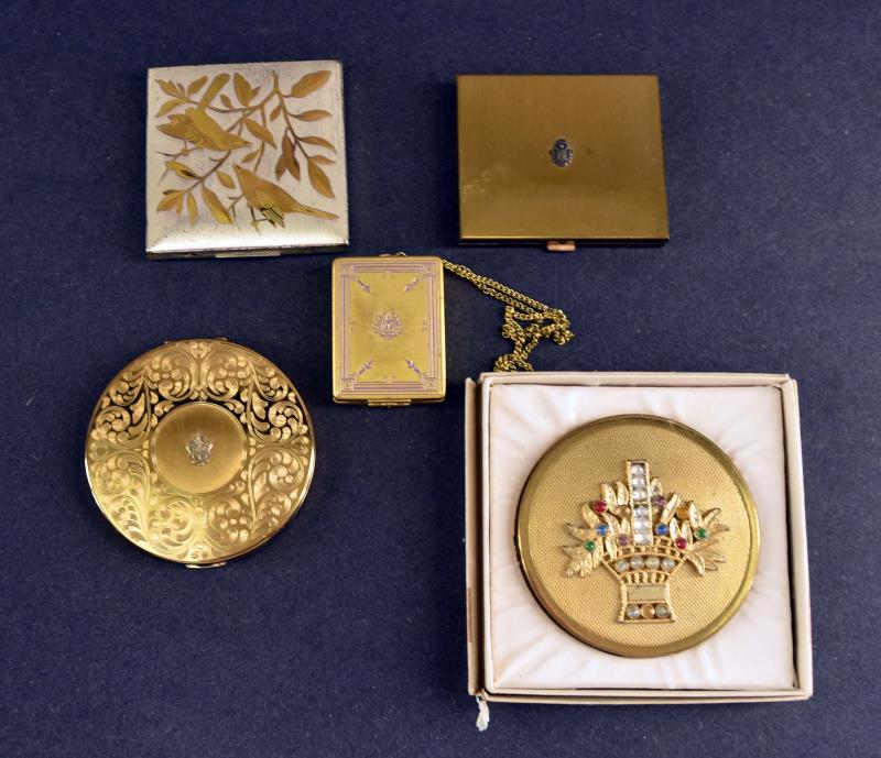 A Group Of Five Vintage Compacts: Consisting Of Two Elgin American, A Wrist Melba Compact, An Unmarked Hampden Compact In The Original Box And An Unmarked Compact. The Hampden Has Two Missing Rhinestones And The Elgin American Bird Co