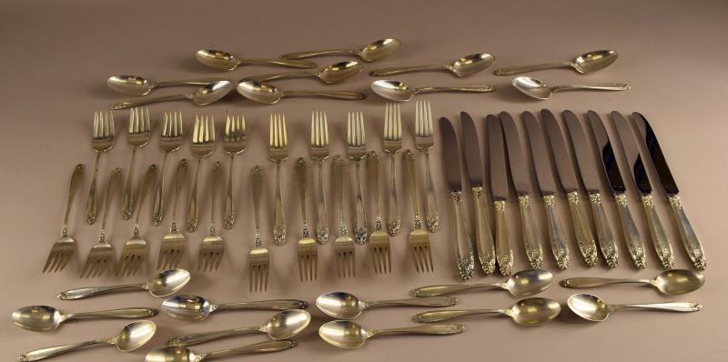 International Prelude Sterling Silver Flatware: Consisting Of Ten Dinner Forks, 10 Cake Forks, 10 Table Spoons, 12 Tea Spoons, 10 Dinner Knives. Not Including The Knives 56.8 Ozt.