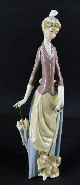 Lladro Figurine: Lady with Dog & an Umbrella, Depicts - Oct 26, 2013 | Charles Fudge Auctioneer