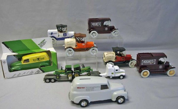 Collection of Ertl Banks & Trucks: John Deere truck w/trailer, Anheuser-Busch car bank, John Deer 50 Chevy bank, A&W barrel bank, Marlin Plumbing Panel Truck Bank, Hershey's Chocolate bank, Alzheimers bank and Hershey's Almond delivery