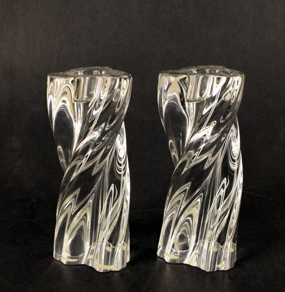 Pair Of Baccarat Crystal Twisted Candle Sticks: Consisting Of A Three Ribbed Twisted Pair Of Candle Sticks, Both Marked Baccarat. Measuring 6" Tall And 2.5" Across, In Excellent Condition, No Nicks, Chips Or Cracks.