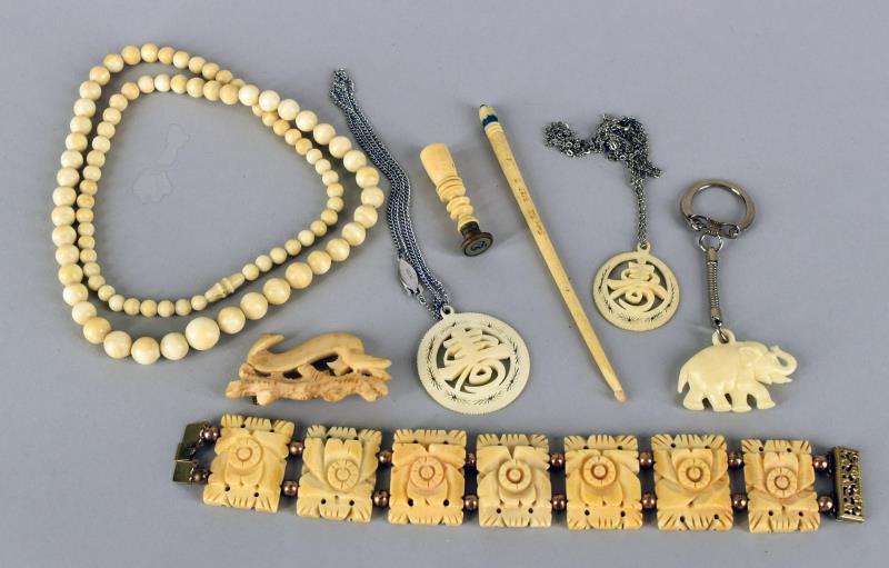 Four Pieces Carved Bone Jewelry & Other Articles: Consisting Pf A Carved Bone Floral Bracelets, Beads, Crochet Hook And Wax Seal. The Blacelet Measures 8" Long And Just Over 1" Wide. The Necklace Measures 23" With A Screw Clasp. Together With Four Ce