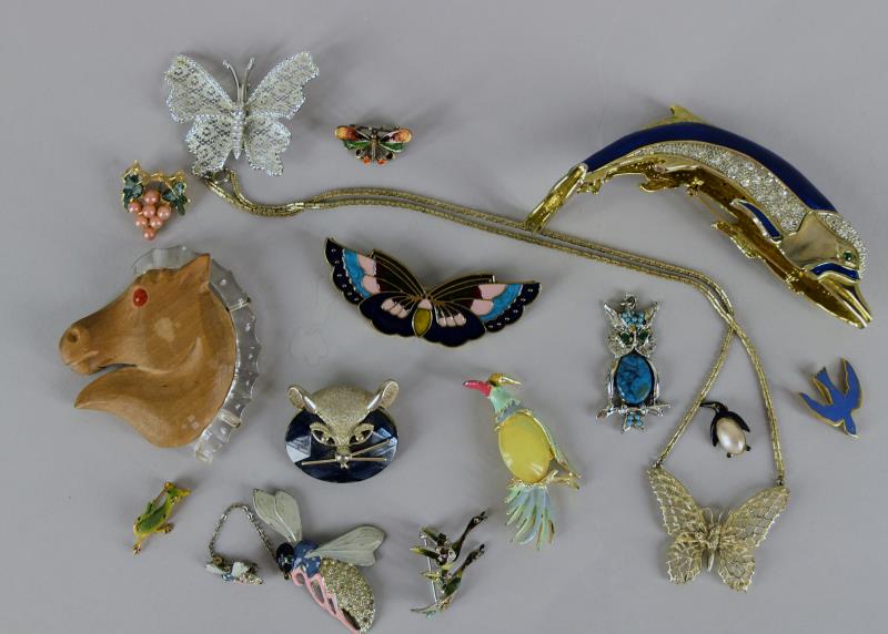 Group Of Animal And Insect Pins Or Brooches: Featuring Eleven Various Animal And Insect Pins, A Grape Cluster Pin, A Butterfly Necklace, An Owl Pendant And An Enamel Fly Sweater Pins. The Sweater Pin Is Missing The Clasp On The Larger Fly. The C