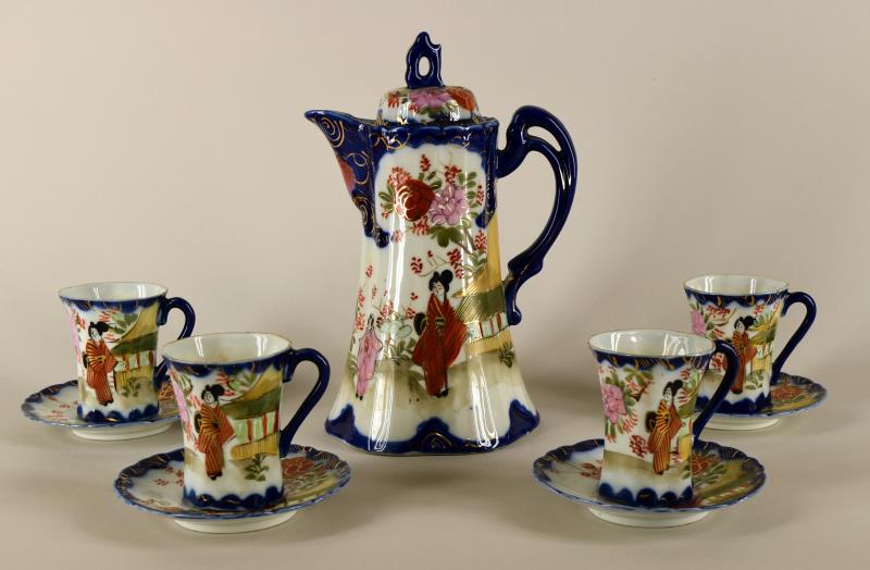 Nippon Chocolate Set: Featuring A Hand Painted Nippon Chocolate Pot With Four Cups And Saucers. The Chocolate Pot Measures 10" X 6.5". The Cups Measure 3" X 2.5" . The Saucers Measure 4.75" Across. All The Pieces Are In Go