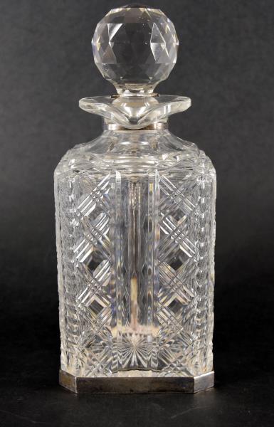Victorian Silver & Cut Glass Betjemann's Decanter: Featuring A Patent Victorian Silver And Cut Glass Betjemann's Spirit Decanter, George Betjemann And Sons, London 1897, The Square Section Hobnail Cut Flask Within A Lockable Cage With Angled Ear Handl