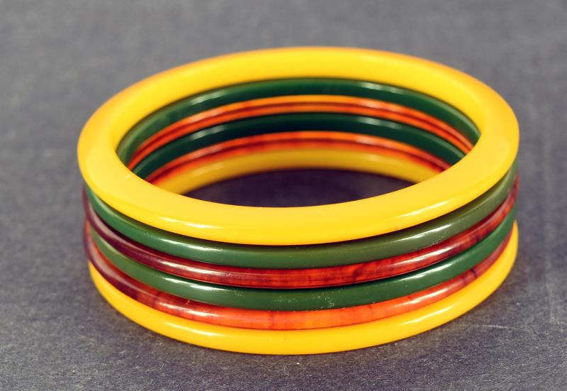 Six Narrow Bakelite Bangle Bracelets: Featuring Two Green, Two Butterscotch And Two Apple Juice. All Tested And Guaranteed Bakelite. The Bangles Measure 2.55" Across The Center And 1/8" Wide.